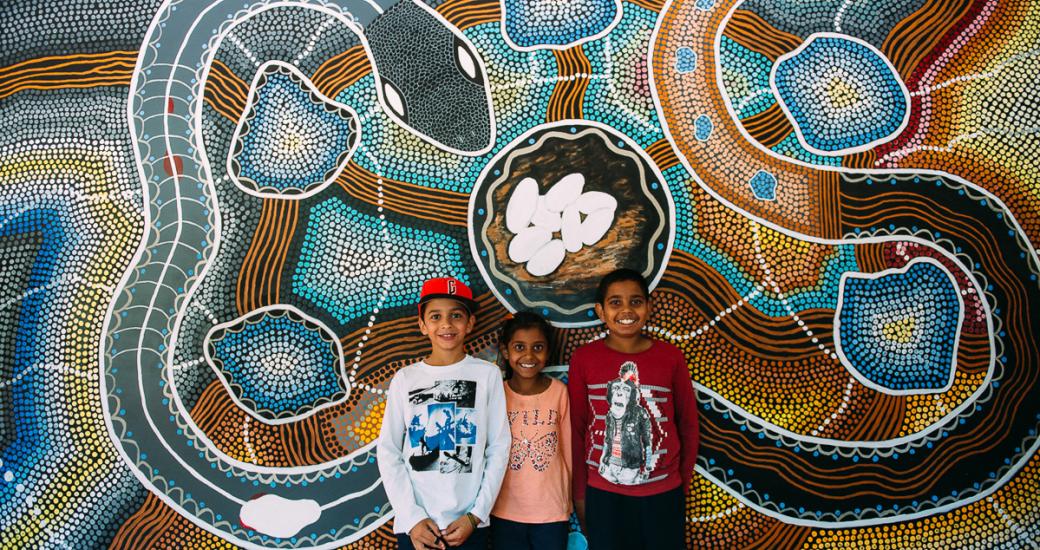 Children with Aboriginal art at Kodja Place