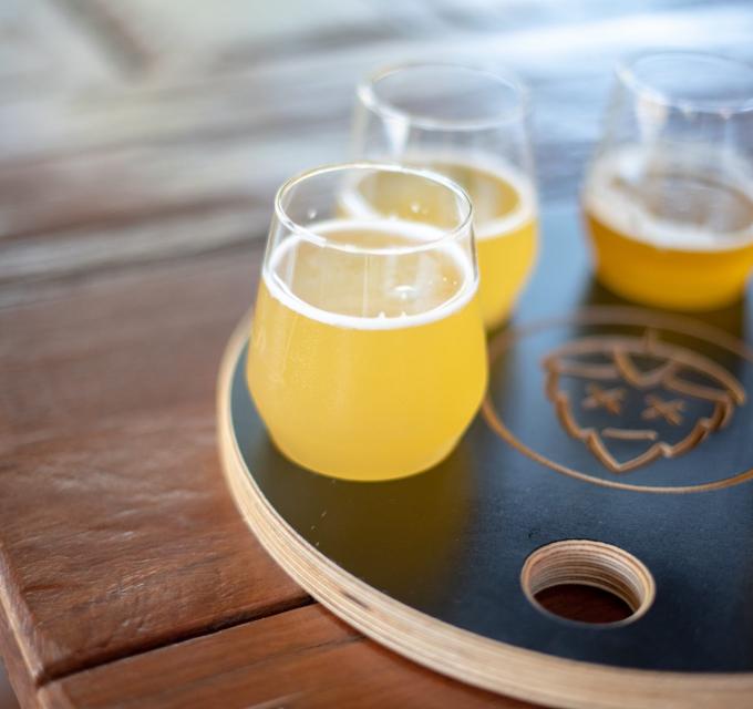 A tasting paddle of different beers